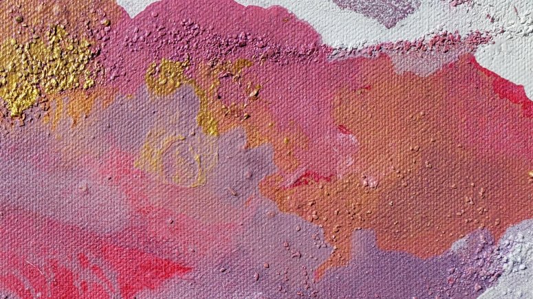 Pink, magenta, gold inkblot bright colour with white negative space